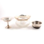 A silver pedestal sweetmeat bowl by Thomas Bradbury & Son and two silver-mounted bowls