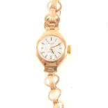 Avia - a lady's 9 carat yellow gold bracelet watch