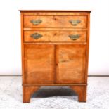 Victorian mahogany cabinet, adapted from a night table, top with crossbanding, now fitted with two