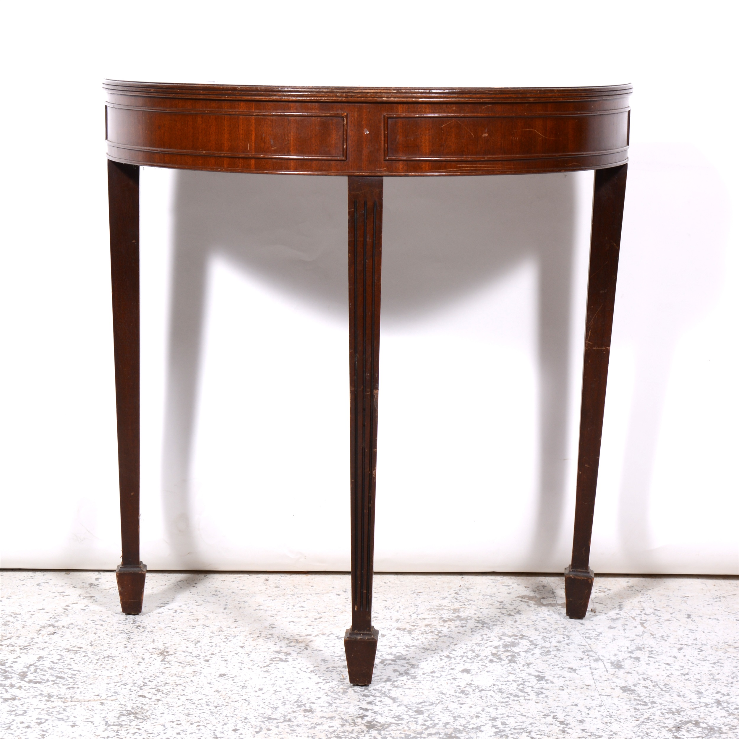 Reproduction mahogany demi lune hall table.