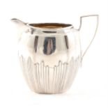A silver half fluted cream/small milk jug by James Dixon & Sons Ltd, Sheffield 1912, 9cm,
