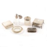 A collection of silver and glass to include two cigarette boxes, perfume atomiser, glass cotton