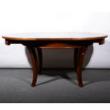 An oak extending dining table, ...