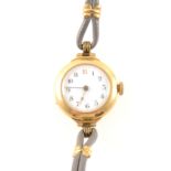 A lady's 18 carat yellow gold wrist watch.