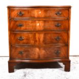 Reproduction mahogany serpentine chest of drawers, the top with a moulded edge, four long