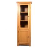 Contemporary light oak freestanding corner cupboard