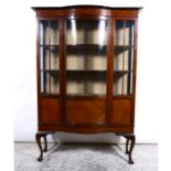 Edwardian mahogany bowfront china cabinet, glazed doors enclosing shelves, cabriole legs, 178cm.