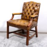 George III style mahogany Gainsborough chair, buttoned leather, moulded legs joined by H-stretchers,