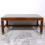 Contemporary mahogany coffee table, the top inset with a printed map, brass mounts, 103cm.