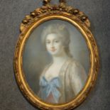 Continental School, late 18th / early 19th Century, head and shoulders portrait of a lady, flowers