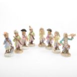 Eight Dresden monkey band figures, early 20th Century