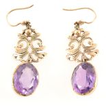 A pair of amethyst drop earrings.