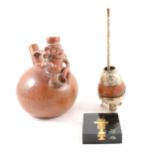 South American style clay pot, smoking vessel and a paperweight with gold inclusions.
