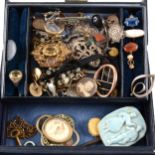 A jewel box containing Victorian and later jewellery, damage to many pieces.