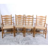 Set of six elm and ash ladder-back dining chairs, comprising two elbow chairs, four single chairs,