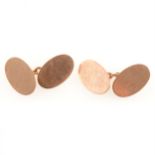 A pair of 9 carat rose gold chain link cufflinks polished faces, total weight approximately 7.9gms.