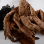 Thirteen items of fur in a suitcase