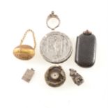 A tray of collectable charms and pin wheel, thimble case, buttonhole watch,