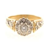 A vintage diamond cluster ring.