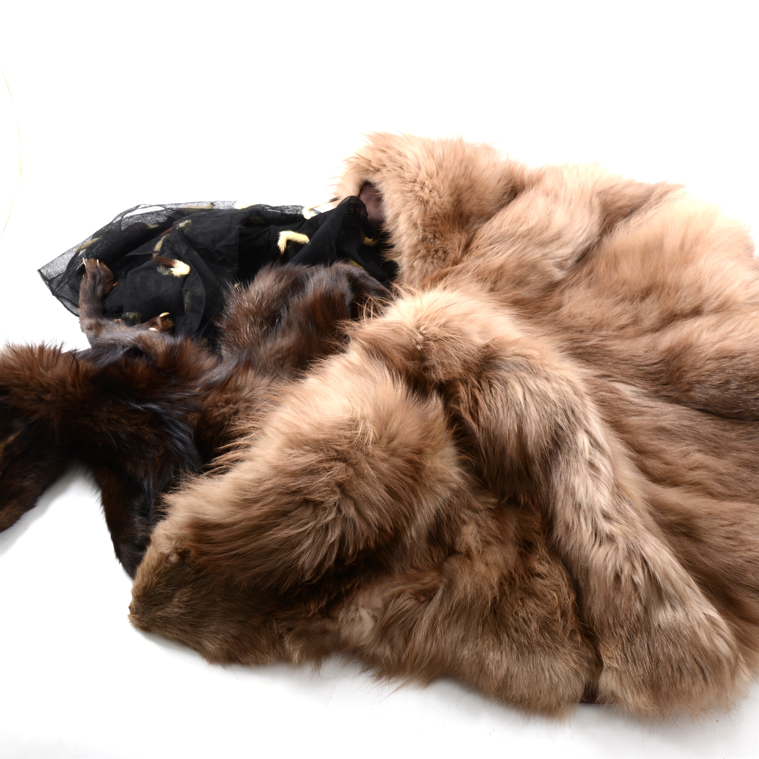 Fourteen items of fur in a Globetrotter case