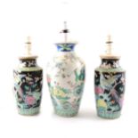 Pair of Chinese Famille Noir shouldered vases,