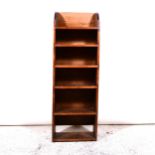 Narrow stained pine shelves,