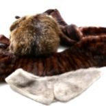 Twelve items of fur in a Globetrotter case