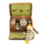 Pelham Puppet clown, boxed, along with a vintage wicker picnic basket with interior, 36cm length.