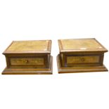 A pair of Victorian figured walnut table top stands