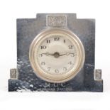 An Art Deco pewter-faced presentation strut clock by Liberty & Co., stamped Tudric