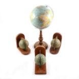 Small German library globe, pair of globe-mounted bookends