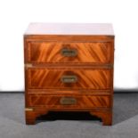 A reproduction mahogany finish campaign style cellaret