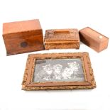 Four wooden boxes, including a bone-backed domino set, and two photograph frames.
