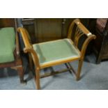 An Edwardian inlaid mahogany dressing table stool