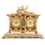 An early 20th Century French gilt metal table clock barometer and thermometer