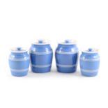A collection of blue glazed storage jars