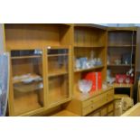 A Nathan teak four-section modular wall unit, ...