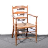 An Arts & Crafts ash and beech elbow chair