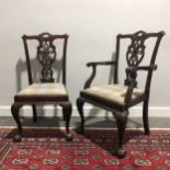 A set of six reproduction Chippendale inspired dining chairs