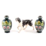Pair of Art Nouveau pottery vases, with silver collars, and a Beswick pointer