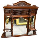 A Victorian walnut overmantel