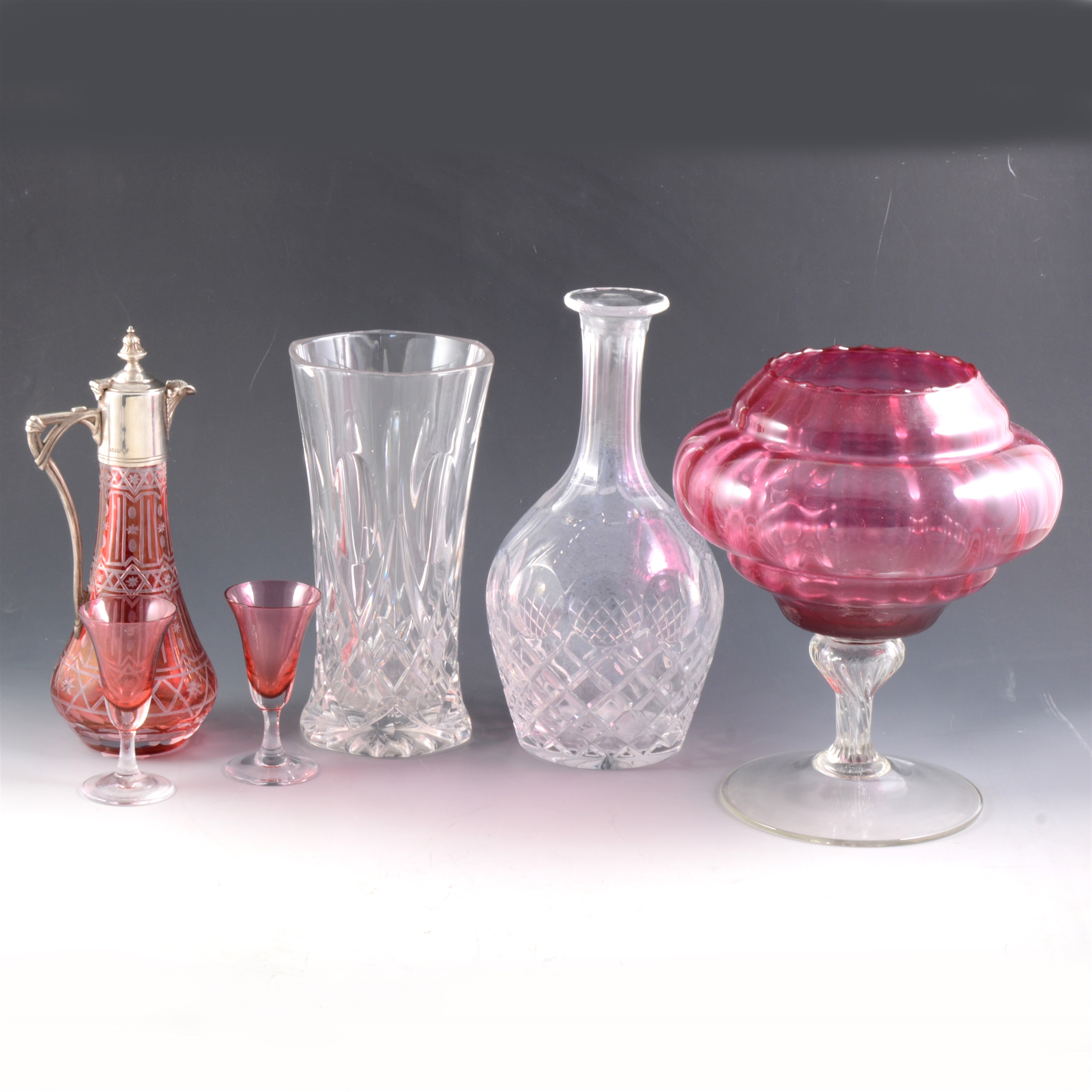 A Victorian ruby overlaid claret jug, plated mounts,, small collection of cranberry glass and