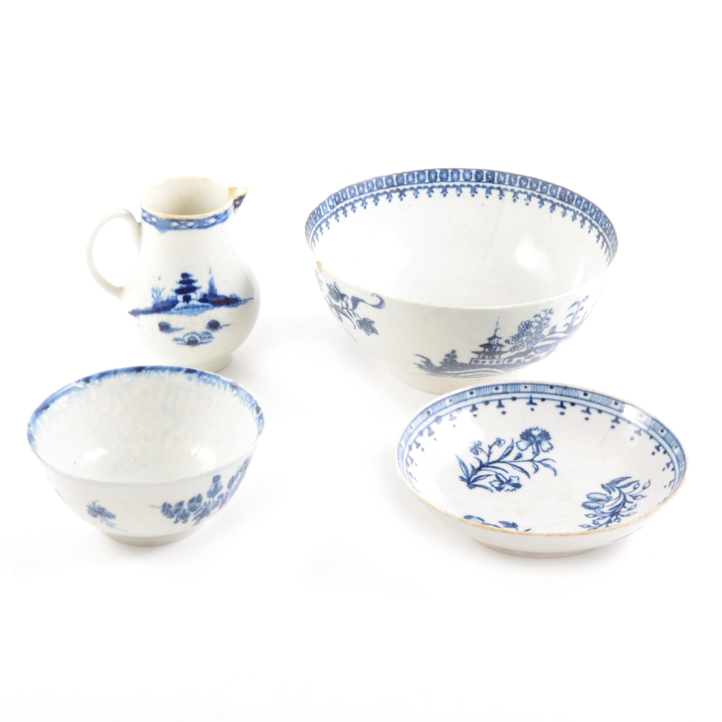 Worcester jug, 18th Century, blue and white, a similar saucer and two bowls, all damaged