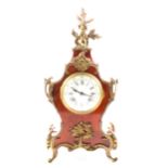 A late 19th Century French tortoiseshell veneered mantel clock