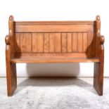 A Victorian pitch pine pew of small size
