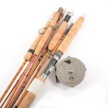 A quantity of split cane fishing rods, and a JW Taylor Trudex centre pin reel