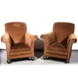 A pair of traditional deep easychairs