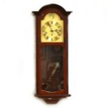 Modern German wall clock, by AMS, stained wood case