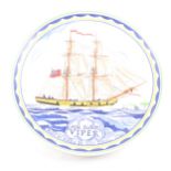 A Poole Pottery plate, commemorating the building of the HM Sloop Viper