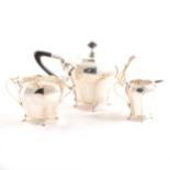 An Art Nouveau style silver three-piece teaset by Roberts & Belk Ltd